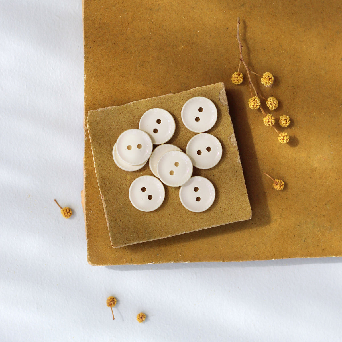 Boutons 12mm pour la couture de vêtements de couleur blanc cassé